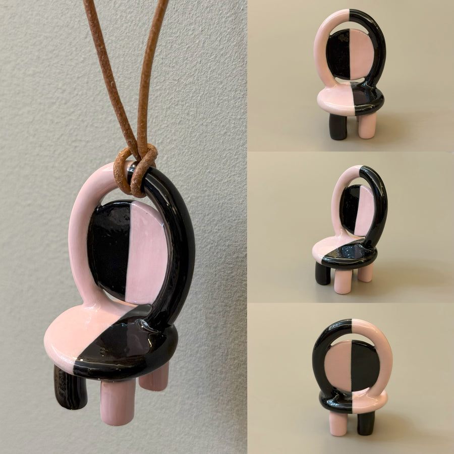 Fantasy ceramic chair necklace with glossy black and soft pink color blocking