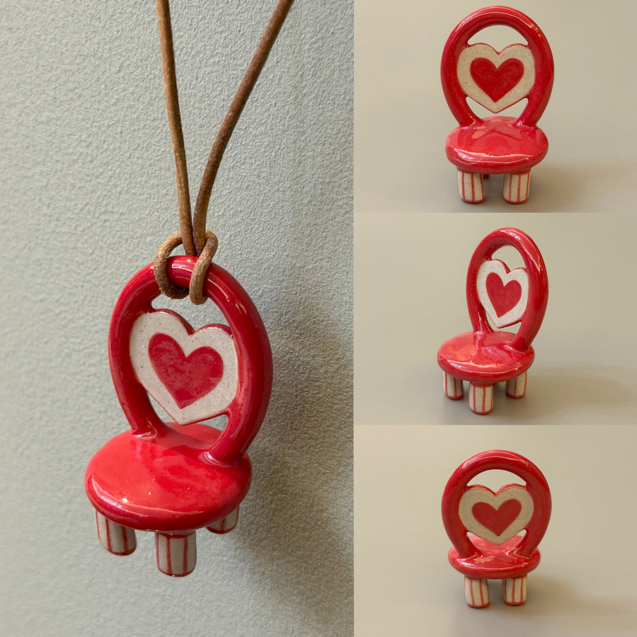 Heartbeat red ceramic chair necklace with heart panel – front view