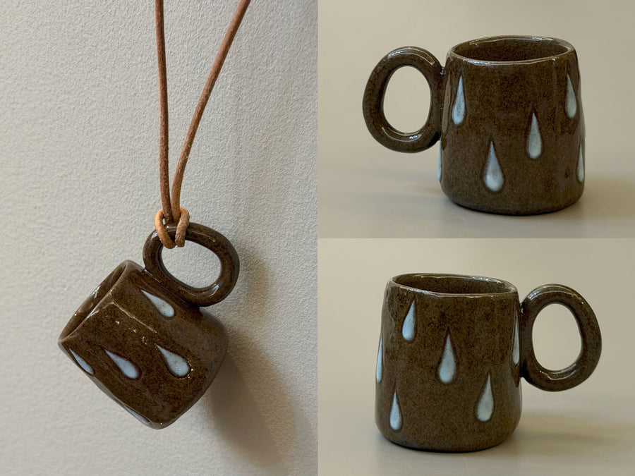 Raindrops dark brown ceramic cup necklace with pale blue drops